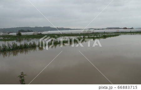 After hard rain cultivated fields are flooded by 66883715