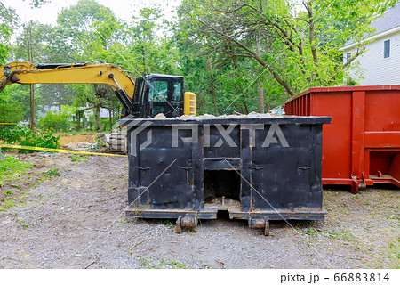 Industrial dumpster filled loaded rubbish removal Industrial dumpster filled loaded rubbish removal 66883814