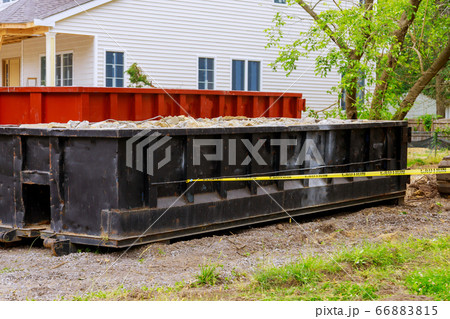 Loaded dumpster a construction home renovation Loaded dumpster a construction home renovation 66883815