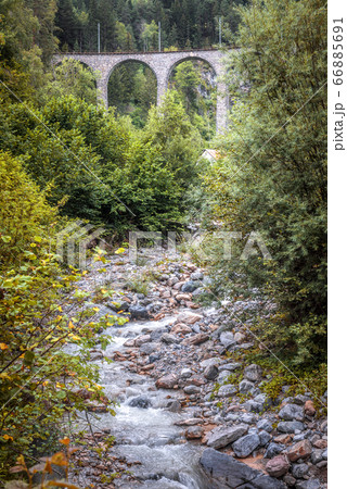 Landscape with old viaduct in forest, Filisur, 66885691