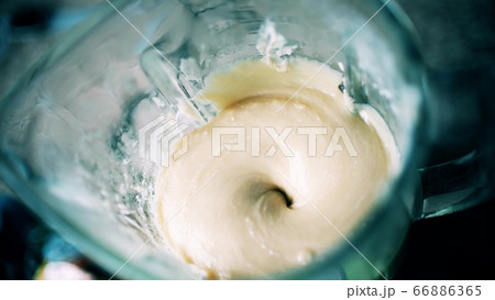 Making dough in a kitchen blender. Cooking at home 66886365