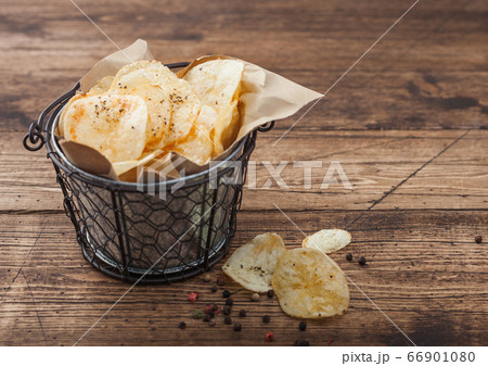 Crunchy potato crisps chips with black pepper in Crunchy potato crisps chips with black pepper in 66901080