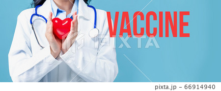 Vaccine theme with a doctor holding a heart 66914940