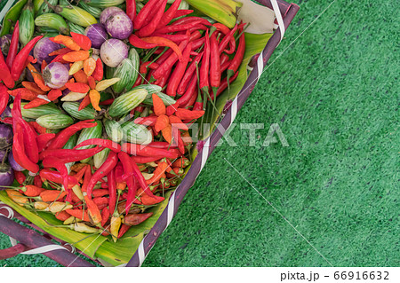 assorted raw vegetables with organic food in the basket. assorted raw vegetables with organic food in the basket. 66916632