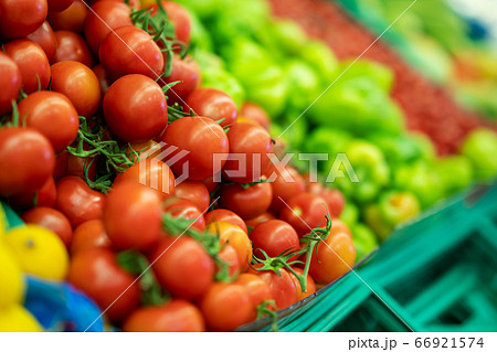 Fresh tomato and peppers in grocery markets full of vegetables 66921574