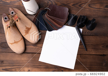 Leather samples for shoes and wooden shoe last on Leather samples for shoes and wooden shoe last on 66924902
