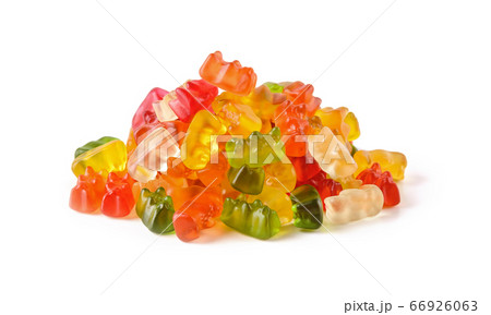 Pile of multicolored gummy bears candy isolated on white background.  66926063