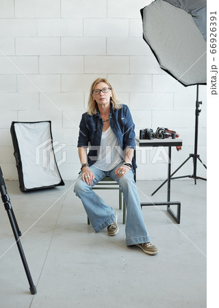 Female photographer in photo studio Female photographer in photo studio 66926391