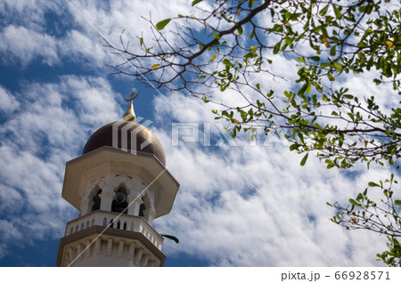 Minaret with green plant at Masjid Kapitan Keling Minaret with green plant at Masjid Kapitan Keling 66928571