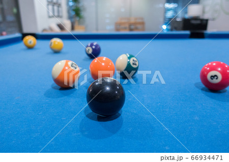 Billiard balls on a pool table Billiard balls on a pool table 66934471