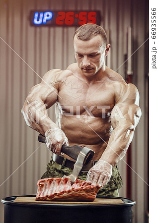 Fitness man at workout in gym 66935566