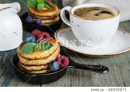 Pancakes with berries 66936671