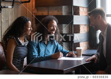 African couple sign contract buy services insurance after negotiations 66936836