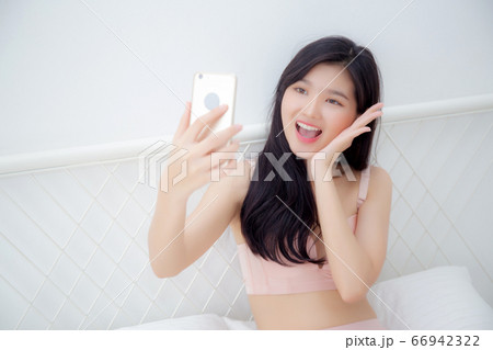 Elegant Sensual Asian Girl Posing In White Underwear Stock Photo, Picture  and Royalty Free Image. Image 80923035.