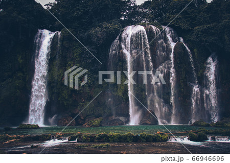 Dark and moody cinematic scenery of Ban Gioc or  Detian Falls in Cao Bang, Vietnam during the winter season 66946696