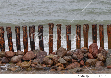 Fencing, breakwater at sea. Fencing, breakwater at sea. 66947636