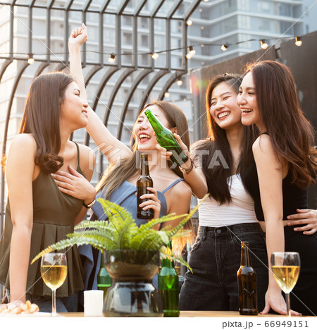 happy asian women party with beer in nightclub 66949151