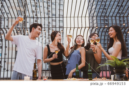 young happy asian friends party dancing with beer young happy asian friends party dancing with beer 66949153
