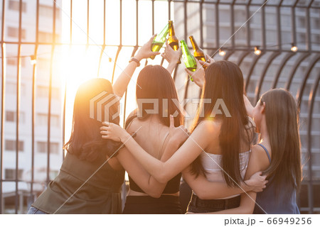 back view of women group party in nightclub 66949256