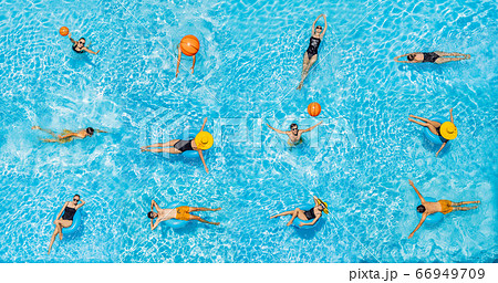 woman with black swimsuit swimming on a blue water pool woman with black swimsuit swimming on a blue water pool 66949709