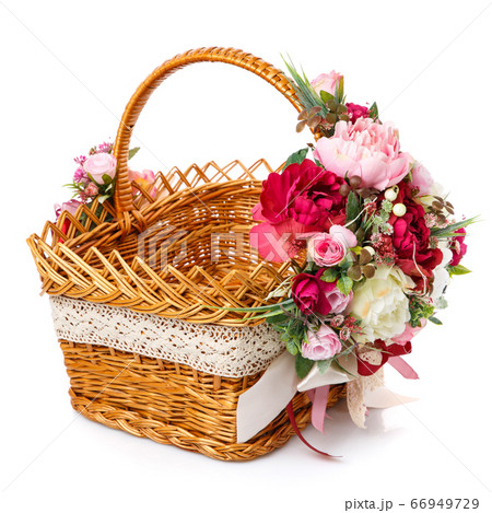 Very beautiful original brown wicker basket decorated with pink and white peonies. Ribbons and lace. 66949729