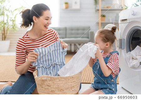 family doing laundry family doing laundry 66950603