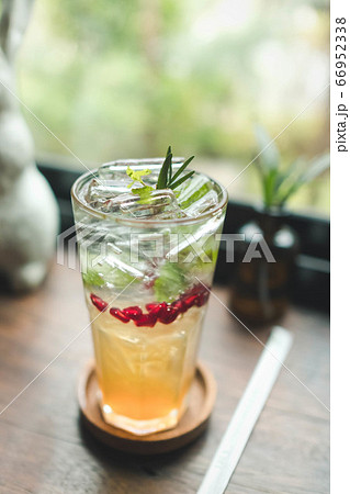 Close up of pomegranate soda in the cafe. Close up of pomegranate soda in the cafe. 66952338