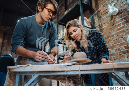 Making a handmade clay pot. Pottery lesson, hobby. 66952483