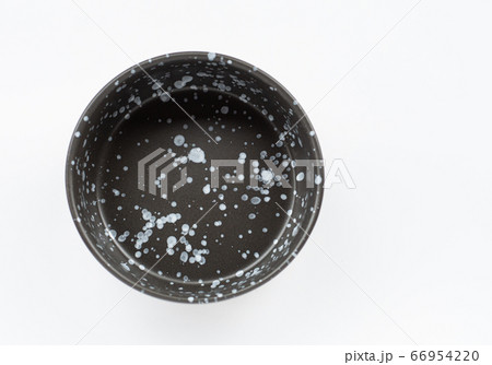 black ceramic bowl isolated on white background 66954220