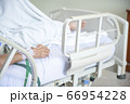 Hand of elder Asian woman patient on bed in 66954228