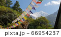 Tibetan prayer flags with mantras flapping on the 66954237