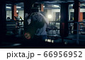 Male athlete is boxing while wearing VR-device 66956952