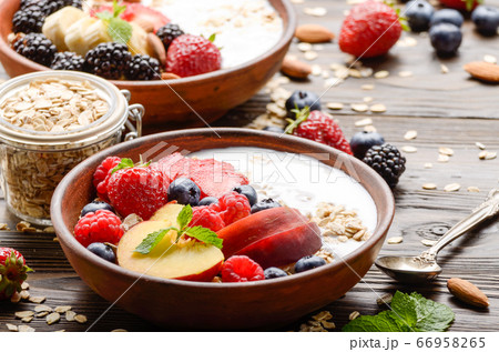 Fruit healthy muesli with peaches strawberry Fruit healthy muesli with peaches strawberry 66958265