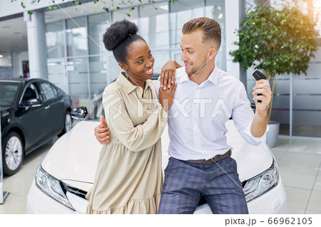 married couple in cars showroom married couple in cars showroom 66962105