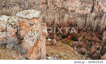Ihlara Valley in Turkey, Known as Ihlara Vadisi in Turkish, the valley is biggest canyon and has a green trees and small river. Ihlara Valley in Turkey, Known as Ihlara Vadisi in Turkish, the valley is biggest canyon and has a green trees and small river. 66963026