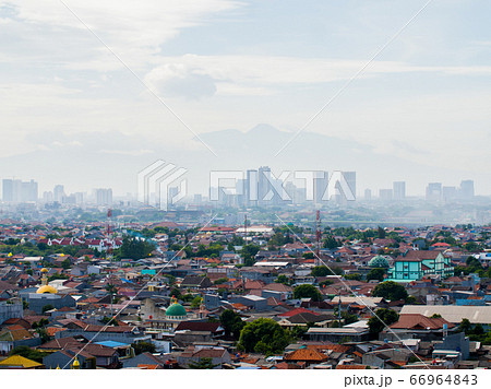 Panorama of the city of Jakarta against the backdrop of the Mountains. Panorama of the city of Jakarta against the backdrop of the Mountains. 66964843