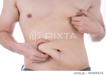 Close up the excessive fat belly on isolated white 66966626