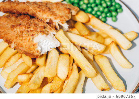 Fish and Chips with peas 66967267