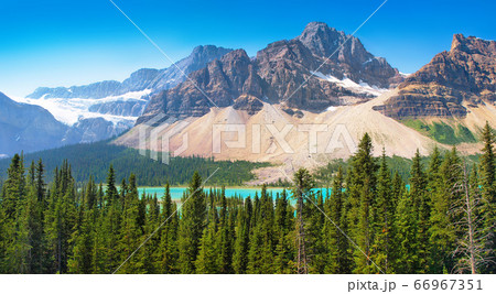 Beautiful landscape with Rocky Mountains and clear mountain lake in Banff National Park, Alberta, Canada Beautiful landscape with Rocky Mountains and clear mountain lake in Banff National Park, Alberta, Canada 66967351