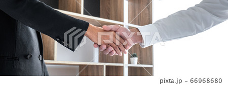 Greeting new colleagues, Handshake while job Greeting new colleagues, Handshake while job 66968680