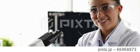 Cheerful chemist in uniform Cheerful chemist in uniform 66968973