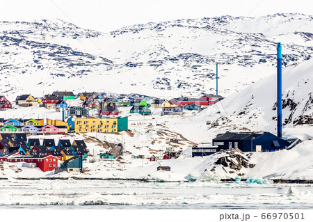 Arctic city panorama with colorful Inuit cottages Arctic city panorama with colorful Inuit cottages 66970501