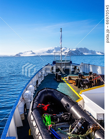 Ship's deck with zodiac boat, heading to Antarctic Ship's deck with zodiac boat, heading to Antarctic 66970545