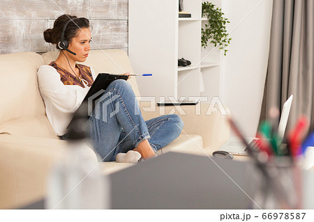 Woman in online job meeting Woman in online job meeting 66978587