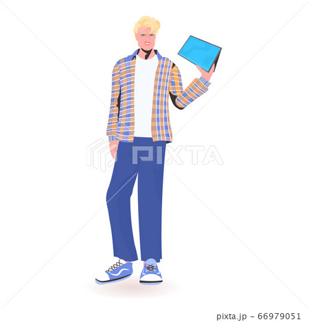 man holding tablet pc young guy model in trendy clothes male cartoon character standing pose man holding tablet pc young guy model in trendy clothes male cartoon character standing pose 66979051