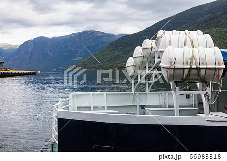 liferaft on a ship in a fjord, 66983318