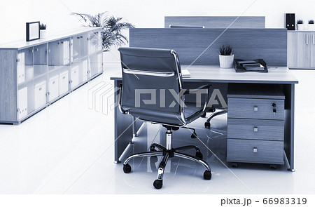 armchair, table and bookcase on white wall armchair, table and bookcase on white wall 66983319