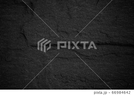 Dark grey black slate background or natural stone Dark grey black slate background or natural stone 66984642