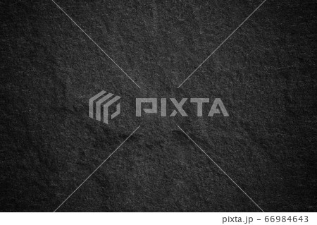 Dark grey black slate background or natural stone Dark grey black slate background or natural stone 66984643