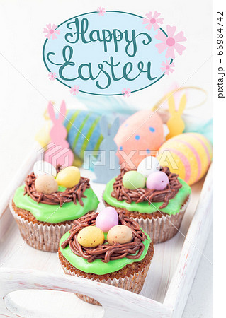 Homemade carrot cake muffins decorated with cream Homemade carrot cake muffins decorated with cream 66984742